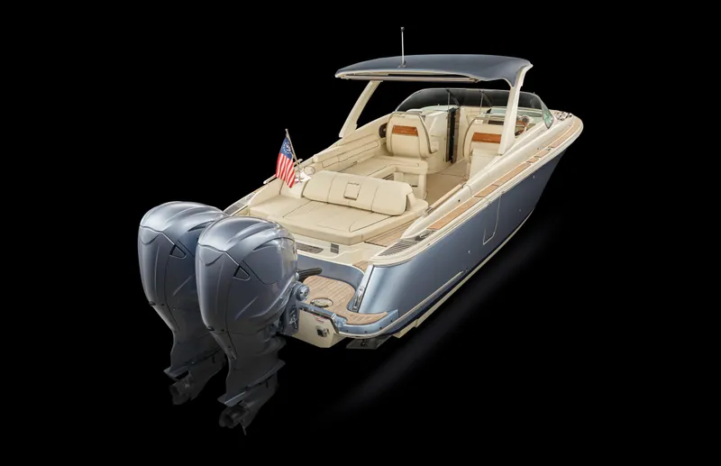 Slide: The Image of 2026 Chris-Craft Launch 35 GT boat with dual outboard engines, luxury seating, and sleek design. - 15