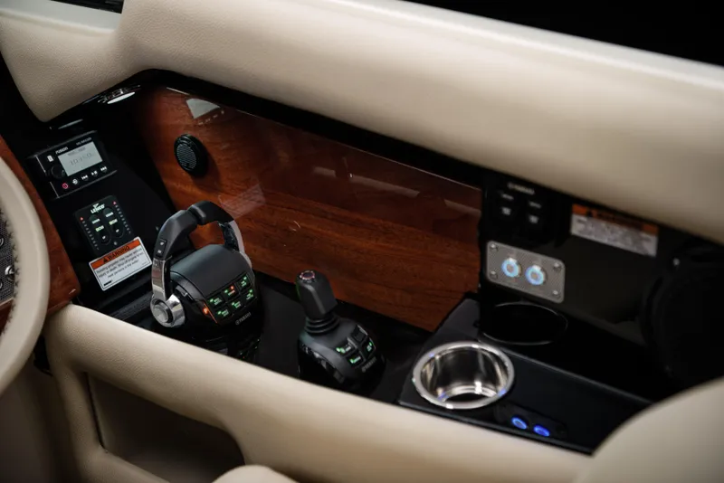 Slide: The Image of Interior dashboard of 2026 Chris-Craft Launch 35 GT with modern controls and wood finish. - 8