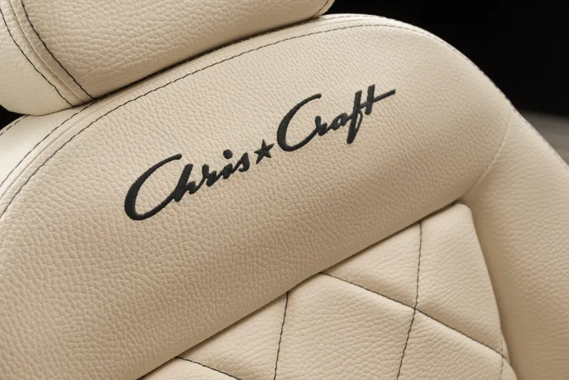 Slide: The Image of Luxurious beige leather seat with Chris-Craft logo, from 2025 Catalina 30 model. - 13