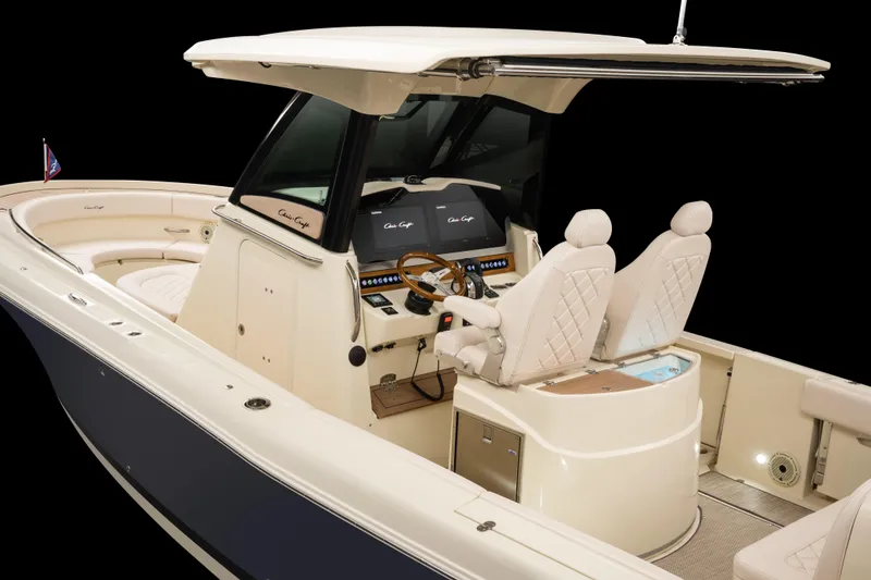 Slide: The Image of 2025 Chris-Craft Catalina 30 boat interior with dual seats and modern dashboard. - 17
