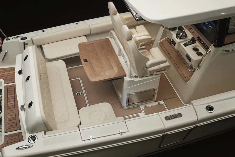 Slide: The Image of 2025 Chris-Craft Catalina 30 interior with luxurious seating and modern helm controls. - 20