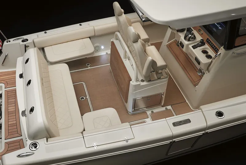 Slide: The Image of 2025 Chris-Craft Catalina 30 interior, featuring luxurious seating and modern dashboard controls. - 21