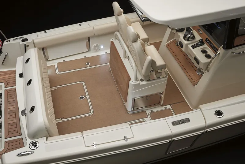 Slide: The Image of 2025 Chris-Craft Catalina 30 interior, featuring elegant seating and modern dashboard controls. - 22