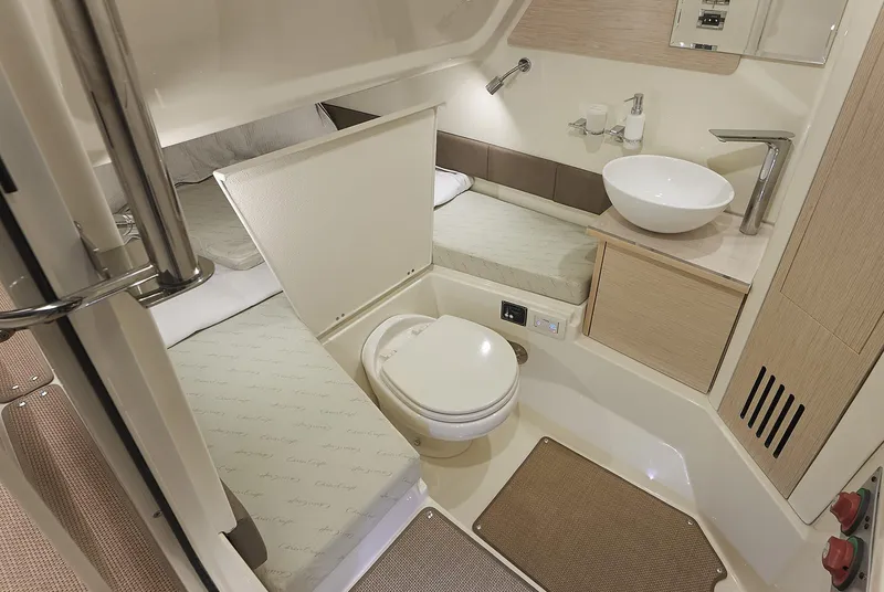 Slide: The Image of 2025 Chris-Craft Catalina 30 interior with modern bathroom and compact design. - 23