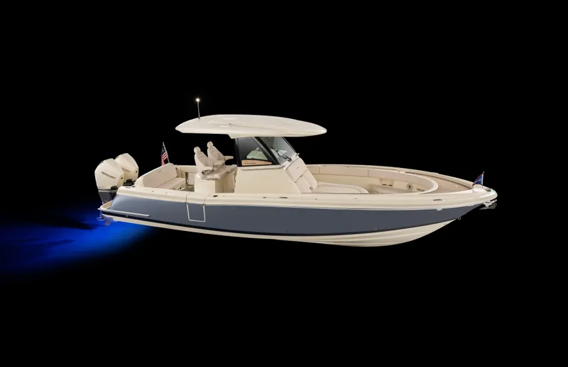 Slide: The Image of 2025 Chris-Craft Catalina 30 boat with sleek design and dual outboard engines. - 4