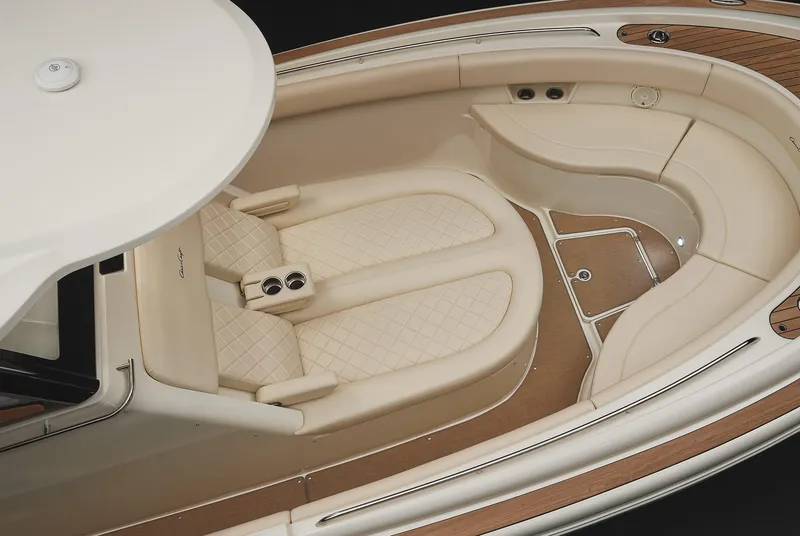 Slide: The Image of Luxurious seating area on 2025 Chris-Craft Catalina 30 boat with elegant beige upholstery. - 7