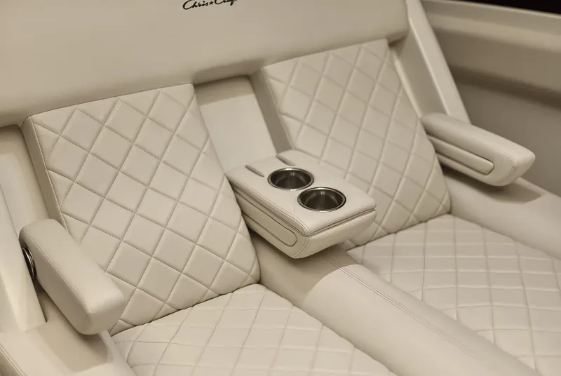 Slide: The Image of Luxurious white leather seating with cup holders on 2025 Chris-Craft Catalina 30 boat. - 8