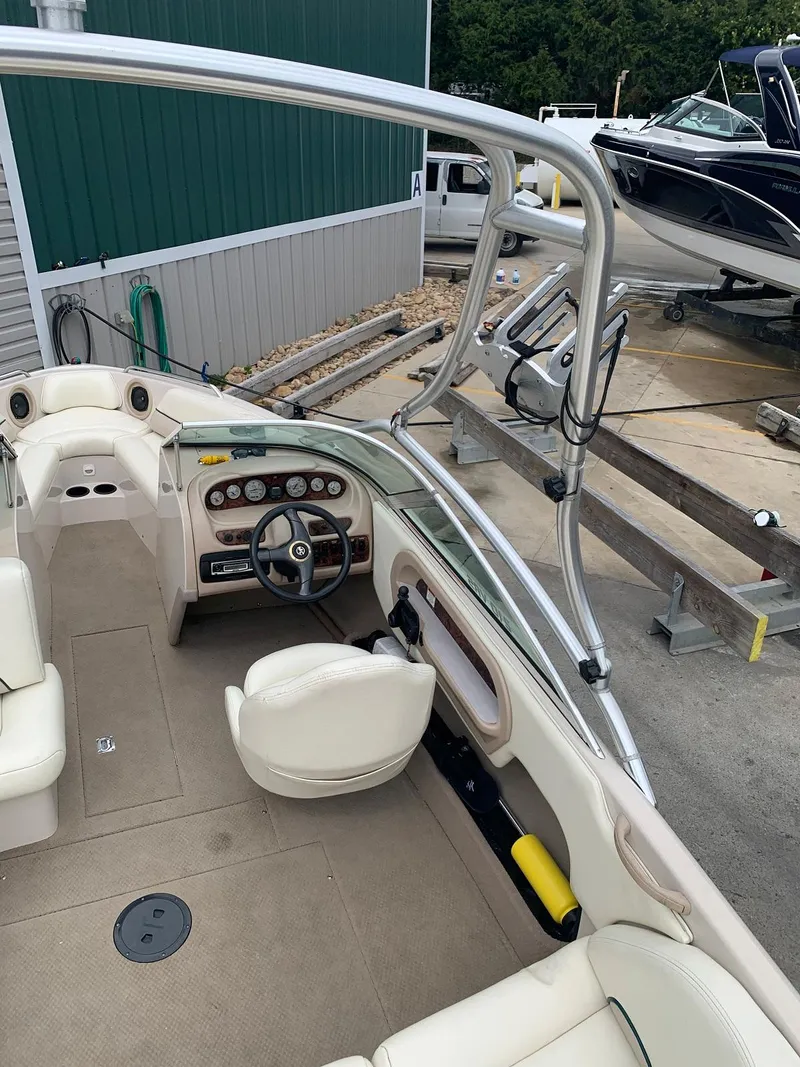 Slide: The Image of Interior view of a 1999 MasterCraft MariStar 210 boat at dock. - 15