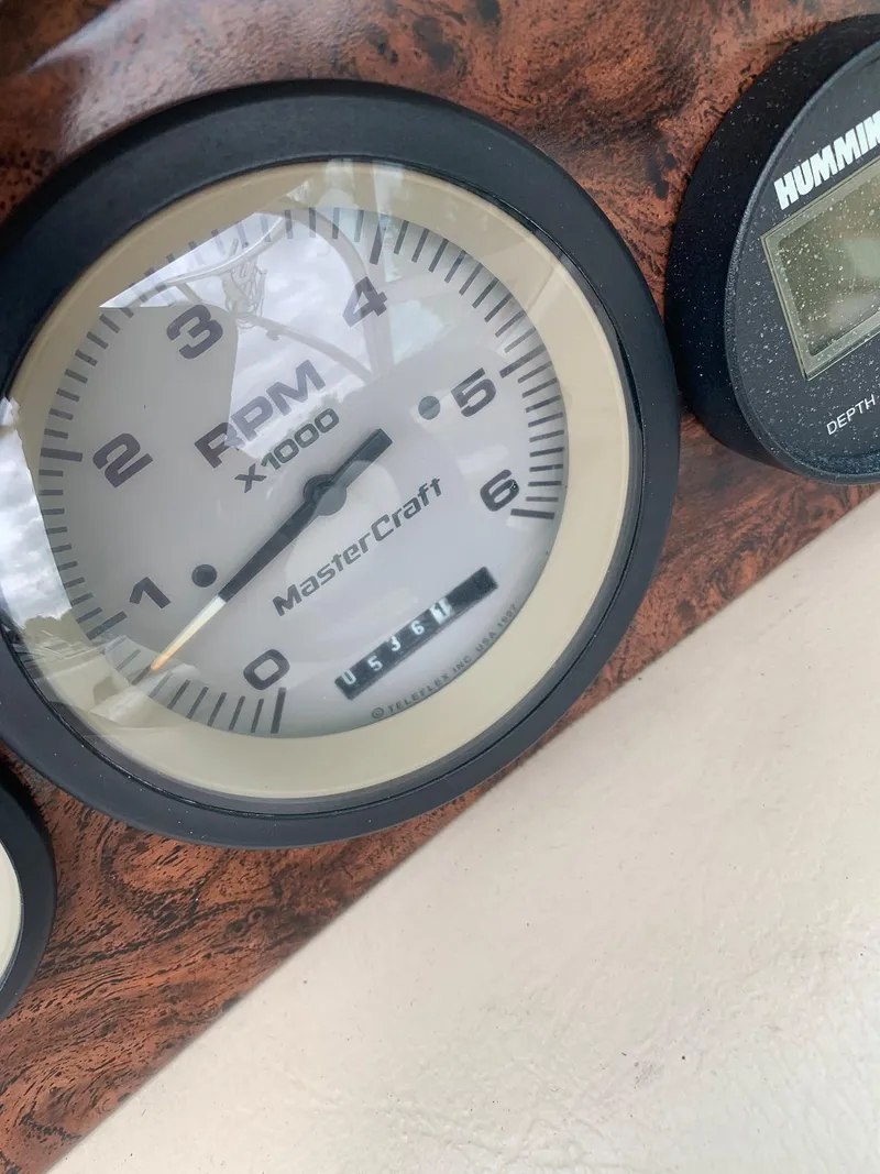 Slide: The Image of Tachometer of a 1999 MasterCraft MariStar 210 boat. - 20