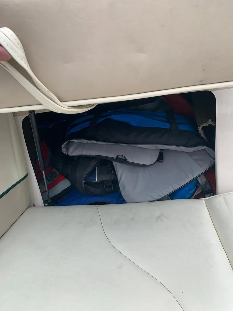 Slide: The Image of Storage compartment in 1999 MasterCraft MariStar 210 boat. - 26