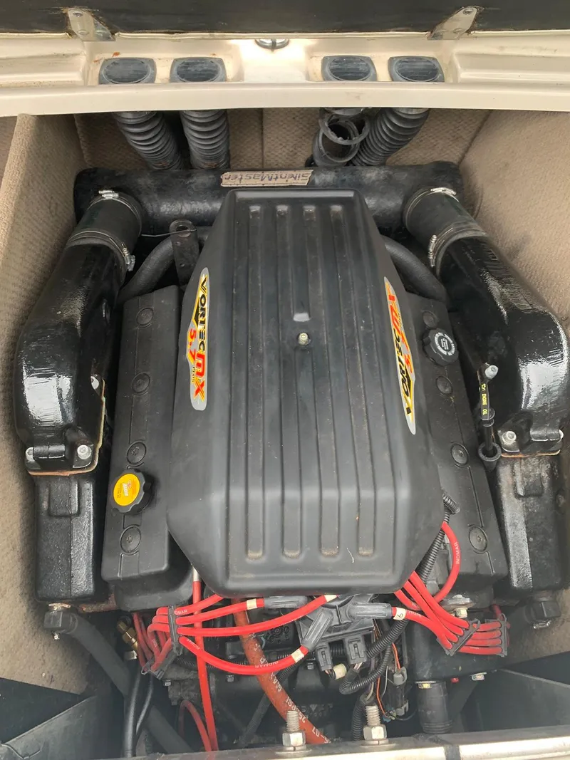 Slide: The Image of Engine of a 1999 MasterCraft MariStar 210 boat, well-maintained. - 31