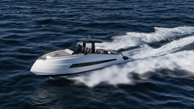 The Image of 2023 Astondoa 377 Coupe speeding on open water. - 0