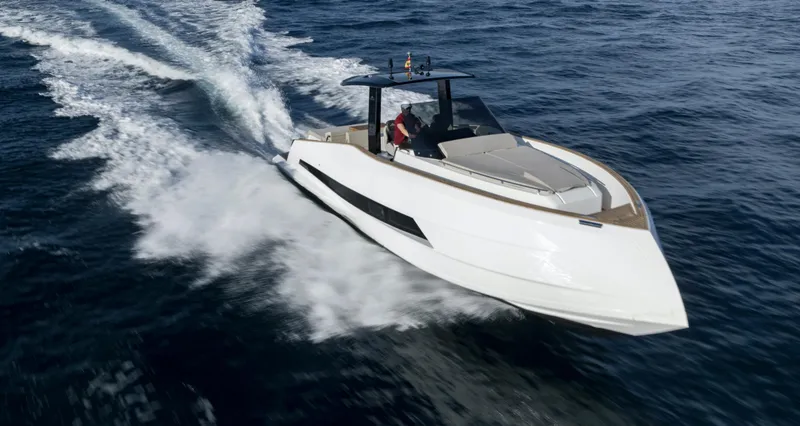 Slide: The Image of 2023 Astondoa 377 Coupe cruising on open water. - 2