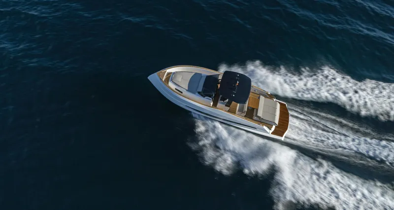 Slide: The Image of 2023 Astondoa 377 Coupe cruising on open water. - 3