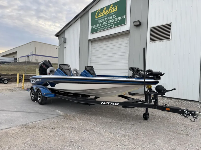 Slide: The Image of 2023 Nitro Z21 XL Pro boat parked outside Cabela's service center. - 39