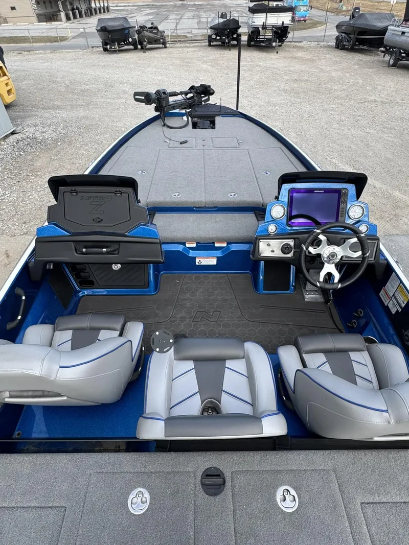 Slide: The Image of 2023 Nitro Z21 XL Pro boat interior with modern dashboard and seating. - 40
