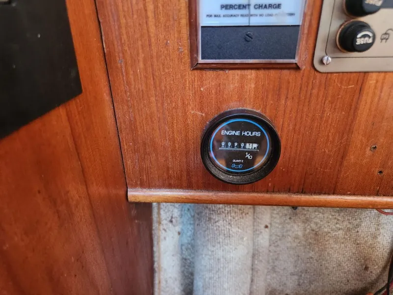 Slide: The Image of Engine hours gauge on 1984 Elite 32 boat dashboard. - 3