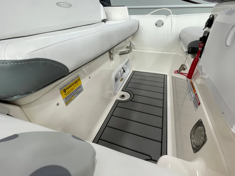 Slide: The Image of 2023 Zodiac Yachtline 490 Deluxe NEO 90hp interior seating and storage area. - 31