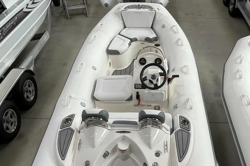 Slide: The Image of 2023 Zodiac Yachtline 490 Deluxe NEO 90hp inflatable boat interior. - 36