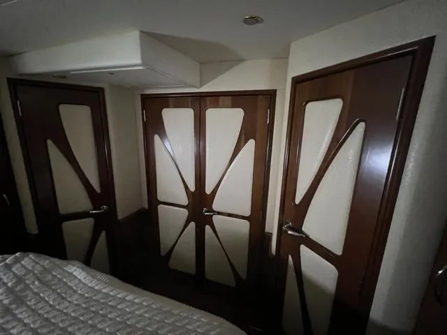 Slide: The Image of Interior of 2009 Ovation 52 yacht with stylish wooden doors. - 26