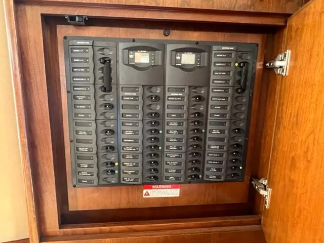 Slide: The Image of Electrical control panel inside a wooden cabinet, Ovation 52, 2009 model. - 7