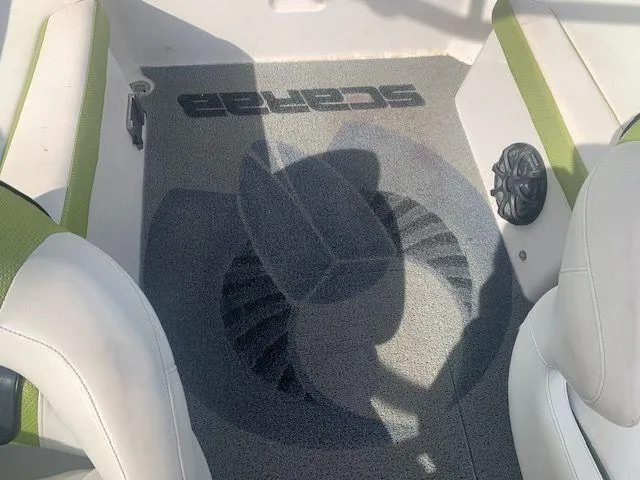 Slide: The Image of 2014 Scarab 215 boat interior with logo on floor mat. - 8