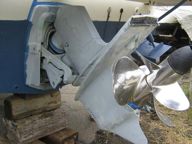 Slide: The Image of 1983 Bayliner 2850 Contessa boat propeller and stern drive close-up. - 15