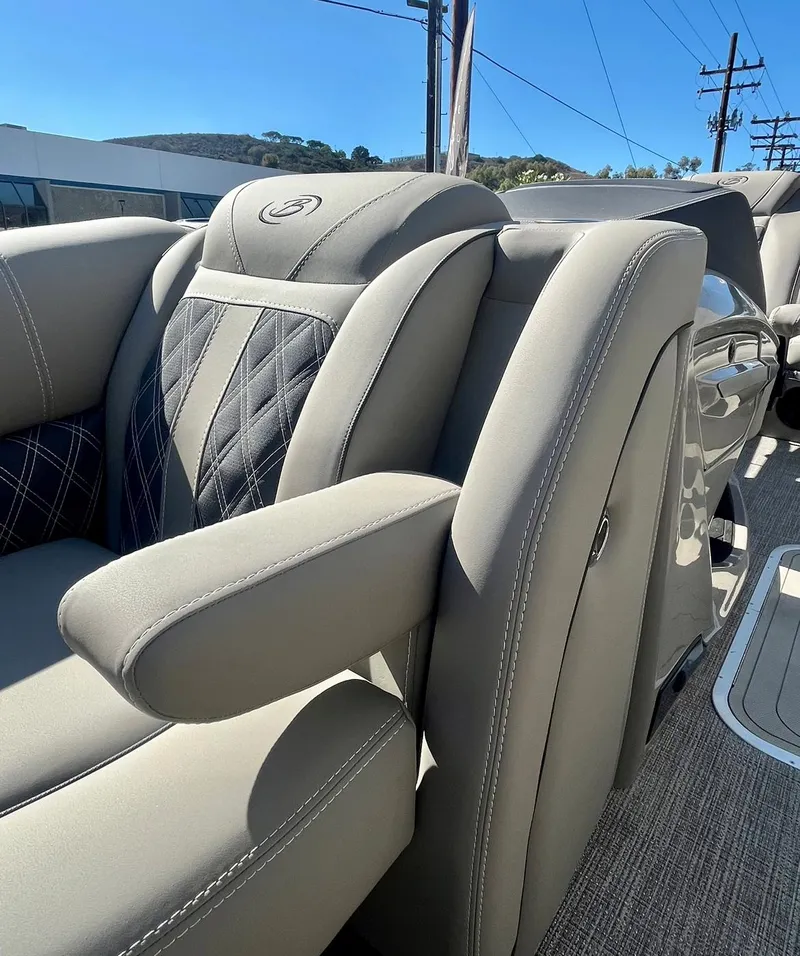 Slide: The Image of 2025 Barletta Lusso 23UC luxury boat seating with elegant upholstery and armrest detail. - 11