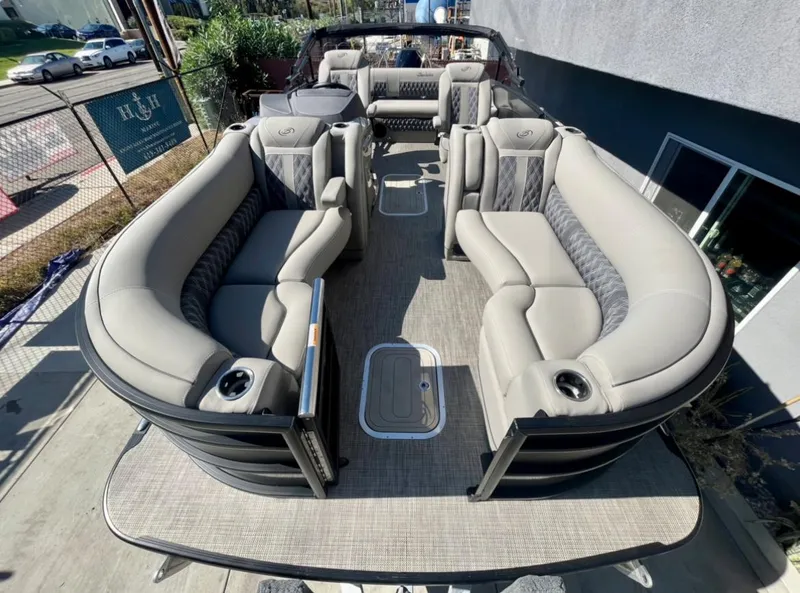 Slide: The Image of 2025 Barletta Lusso 23UC pontoon boat with luxurious seating and modern design. - 17