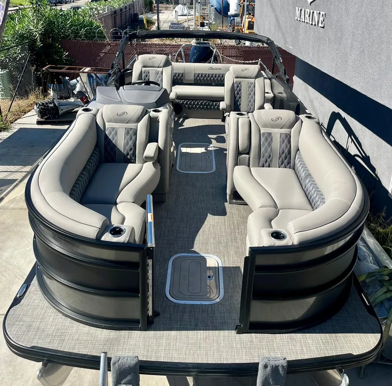 Slide: The Image of 2025 Barletta Lusso 23UC pontoon boat with luxurious seating and modern design. - 18