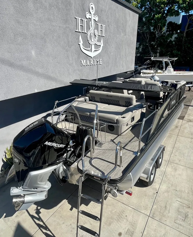 Slide: The Image of 2025 Barletta Lusso 23UC pontoon boat with Mercury engine at H&H Marine. - 2