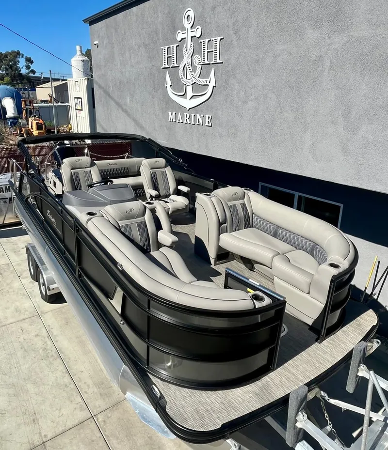 Slide: The Image of 2025 Barletta Lusso 23UC pontoon boat with luxurious seating at H&H Marine. - 4