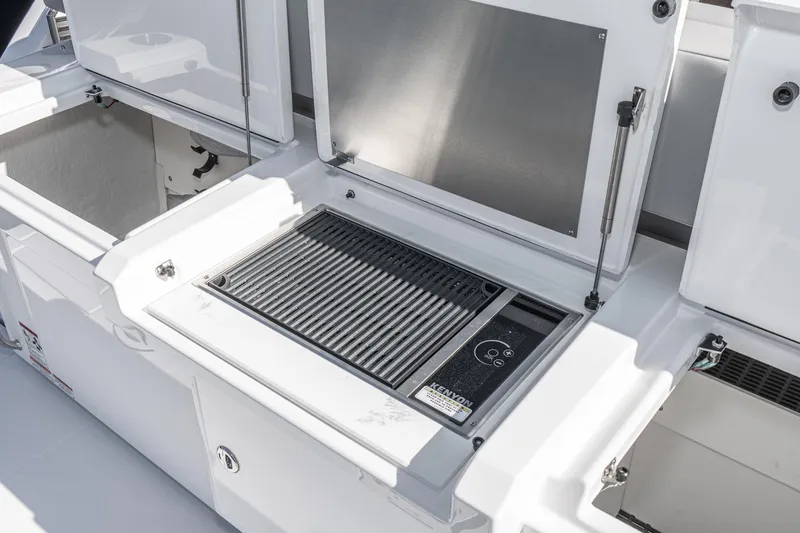 Slide: The Image of Outdoor grill station on 2023 Cruisers Yachts 42 Cantius. - 13