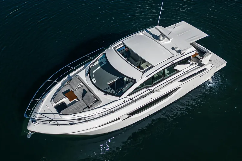 Slide: The Image of 2023 Cruisers Yachts 42 Cantius luxury boat on water. - 3