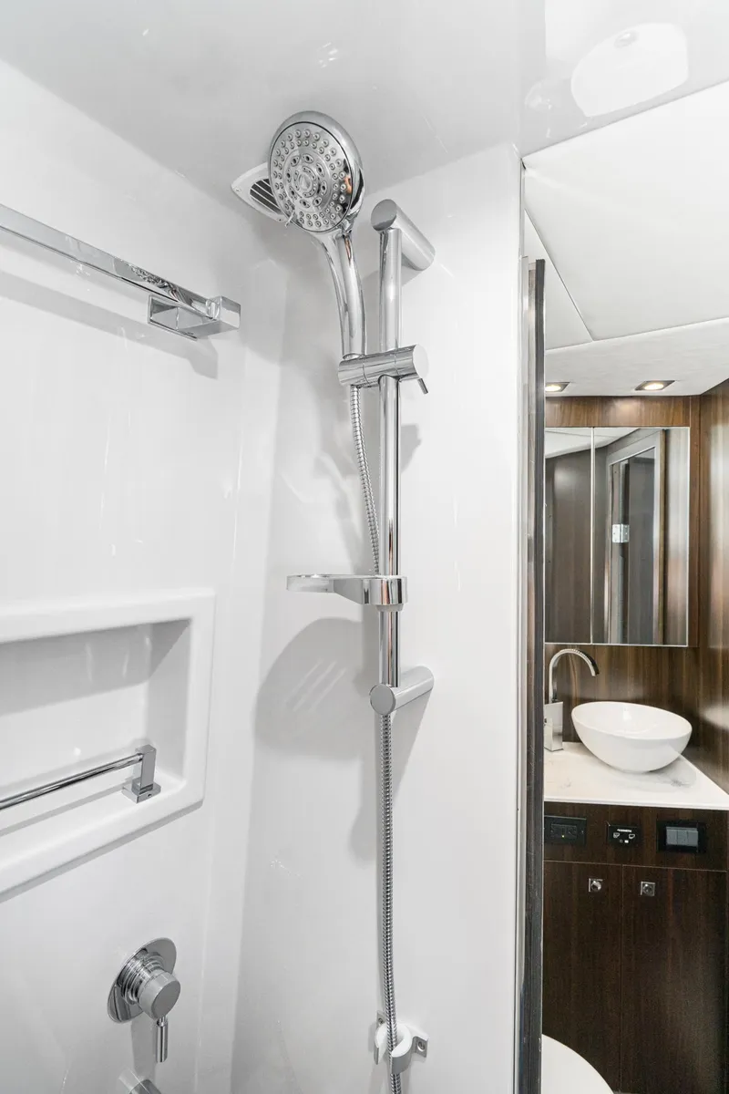 Slide: The Image of 2023 Cruisers Yachts 42 Cantius bathroom with modern shower and sink. - 38