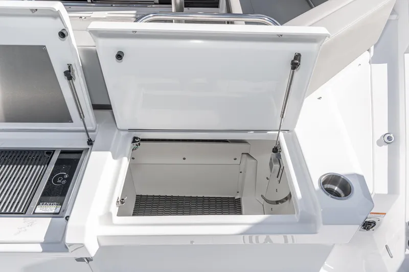 Slide: The Image of 2023 Cruisers Yachts 42 Cantius open storage compartment on deck. - 14