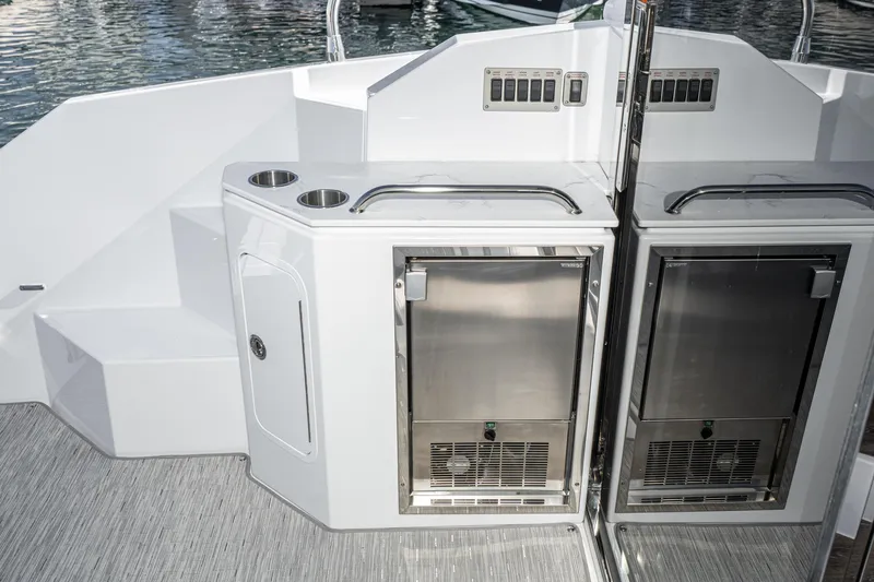 Slide: The Image of 2023 Cruisers Yachts 42 Cantius yacht deck with stainless steel appliances. - 19