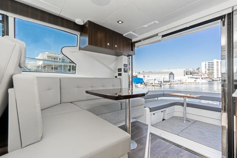 Slide: The Image of 2023 Cruisers Yachts 42 Cantius interior with marina view. - 21