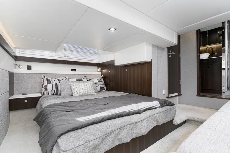 Slide: The Image of Luxurious bedroom interior of 2023 Cruisers Yachts 42 Cantius with modern design. - 40