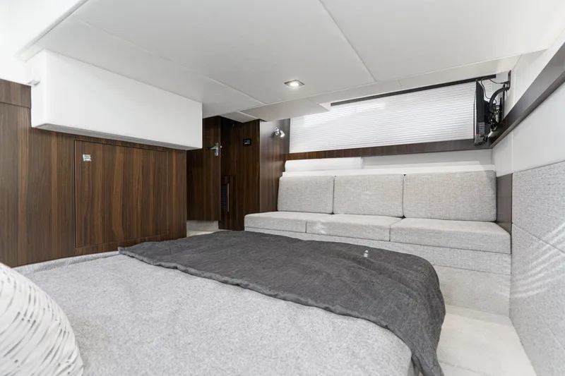 Slide: The Image of 2023 Cruisers Yachts 42 Cantius interior cabin with modern design and cozy seating. - 41