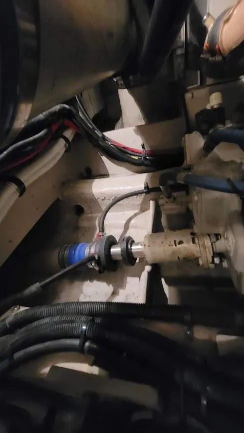 Slide: The Image of Engine room of a 2003 Sea Ray 390 Motor Yacht with visible machinery. - 32