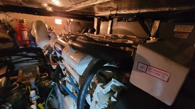 Slide: The Image of 2003 Sea Ray 390 Motor Yacht bathroom with vanity, mirror, and shower. - 39