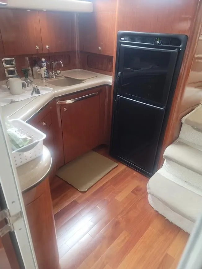 Slide: The Image of Engine room of a 2003 Sea Ray 390 Motor Yacht with visible machinery. - 40