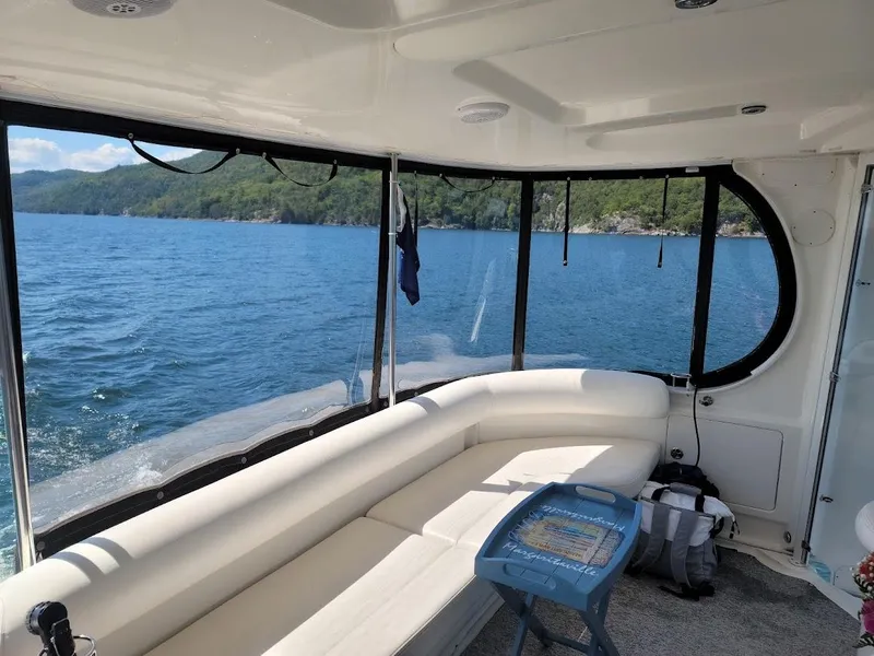 Slide: The Image of Interior of 2003 Sea Ray 390 Motor Yacht with lake view. - 9