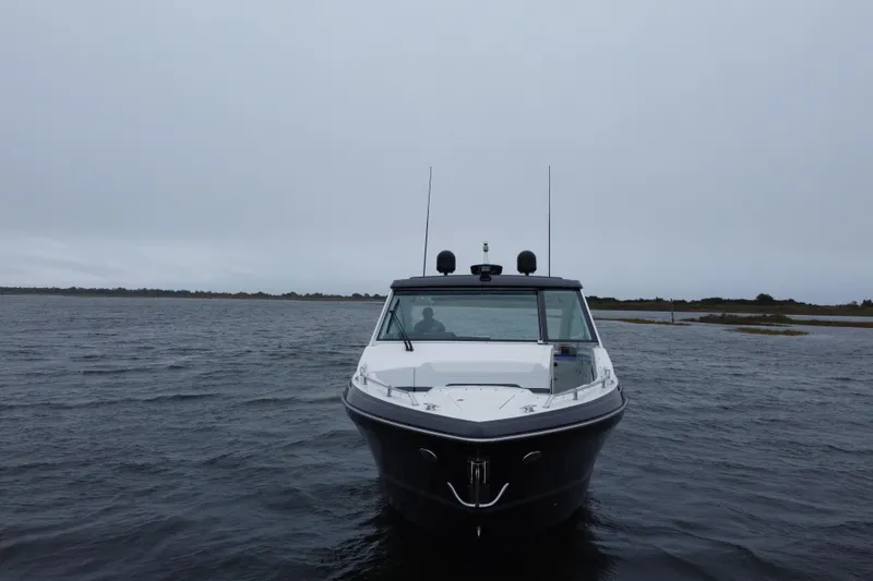 Slide: The Image of 2022 Formula 380 Super Sport Crossover OB on open water, front view. - 10