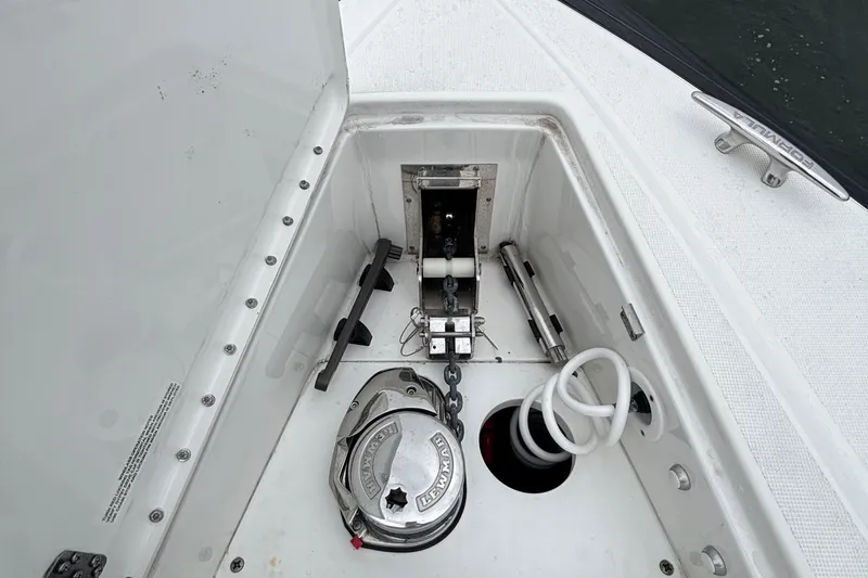 Slide: The Image of Anchor compartment of 2022 Formula 380 Super Sport Crossover OB boat. - 100