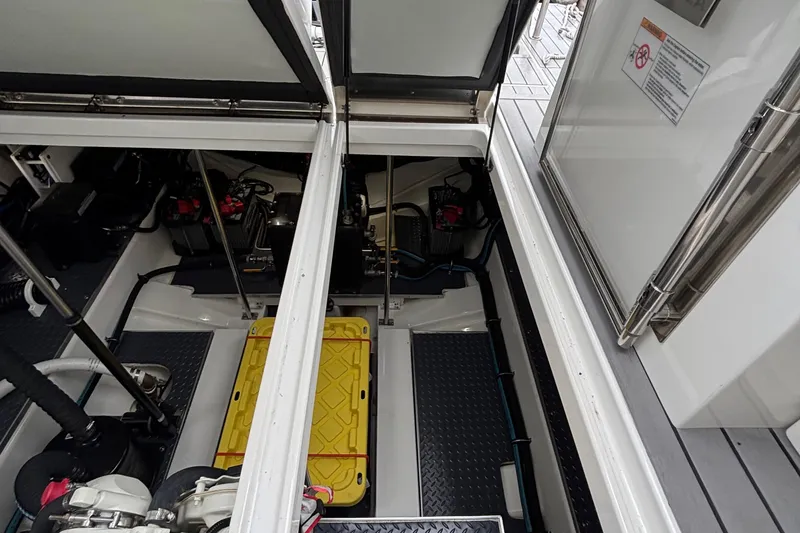 Slide: The Image of Engine compartment of 2022 Formula 380 Super Sport Crossover OB, showcasing mechanical components. - 103