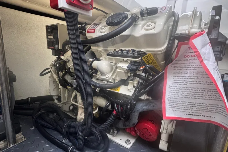 Slide: The Image of Engine compartment of a 2022 Formula 380 Super Sport Crossover OB boat. - 107