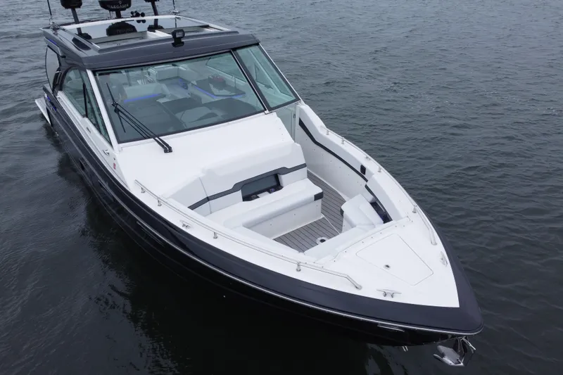 Slide: The Image of 2022 Formula 380 Super Sport Crossover OB on water, showcasing sleek design and spacious deck. - 17