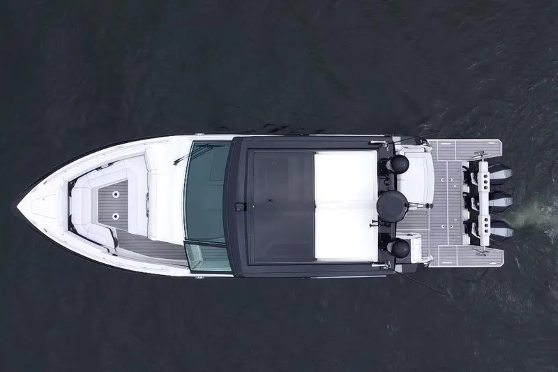 Slide: The Image of Overhead view of 2022 Formula 380 Super Sport Crossover OB boat on water. - 26